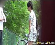 Asian teen pees outdoors from pee peeing
