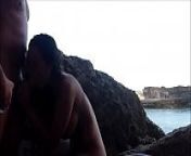 Couple making love by the sea from busty beach wife