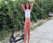 A naked girl rides a scooter through the streets and shocks passers-by naked on public from reallola dasha nudedists scooters and sunflowers and nudists