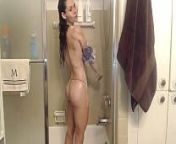 Sexy muscle girl showers from muscle babe