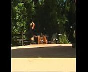 Muscular stud with pleasure puts a sexy dark-skinned beauty on the street near the pool on a big dick from nearly naked on the streets