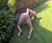 Hosing my ass and cunt out in the garden from anal water