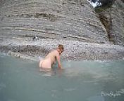 Flashing at the seaside from amateur milf nudist