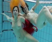 Two hotties submerged underwater from teen nudists pool