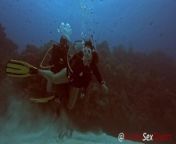 SCUBA Sex Quickie while on a deep dive exploring a coral reef from corai