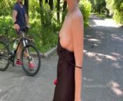 The girl topless is walking in the park in public from openxxxphoto