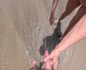 the guy pissed in the sea on public and the girl came to help from nude beach shower